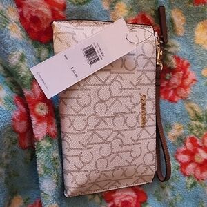 Calvin Klein Cream Wristlet with Brown Strap